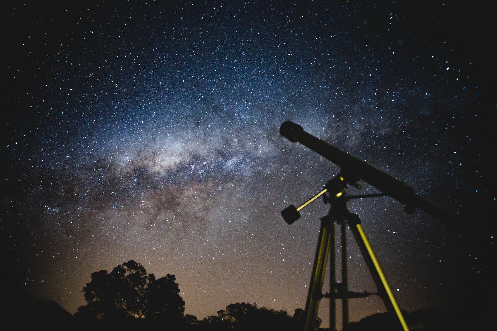 black telescope under blue and blacksky