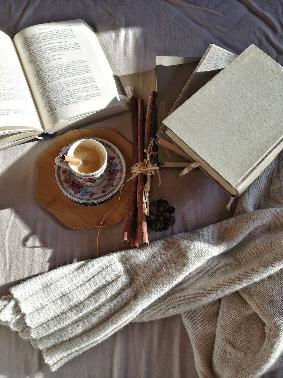 books on brown wooden table