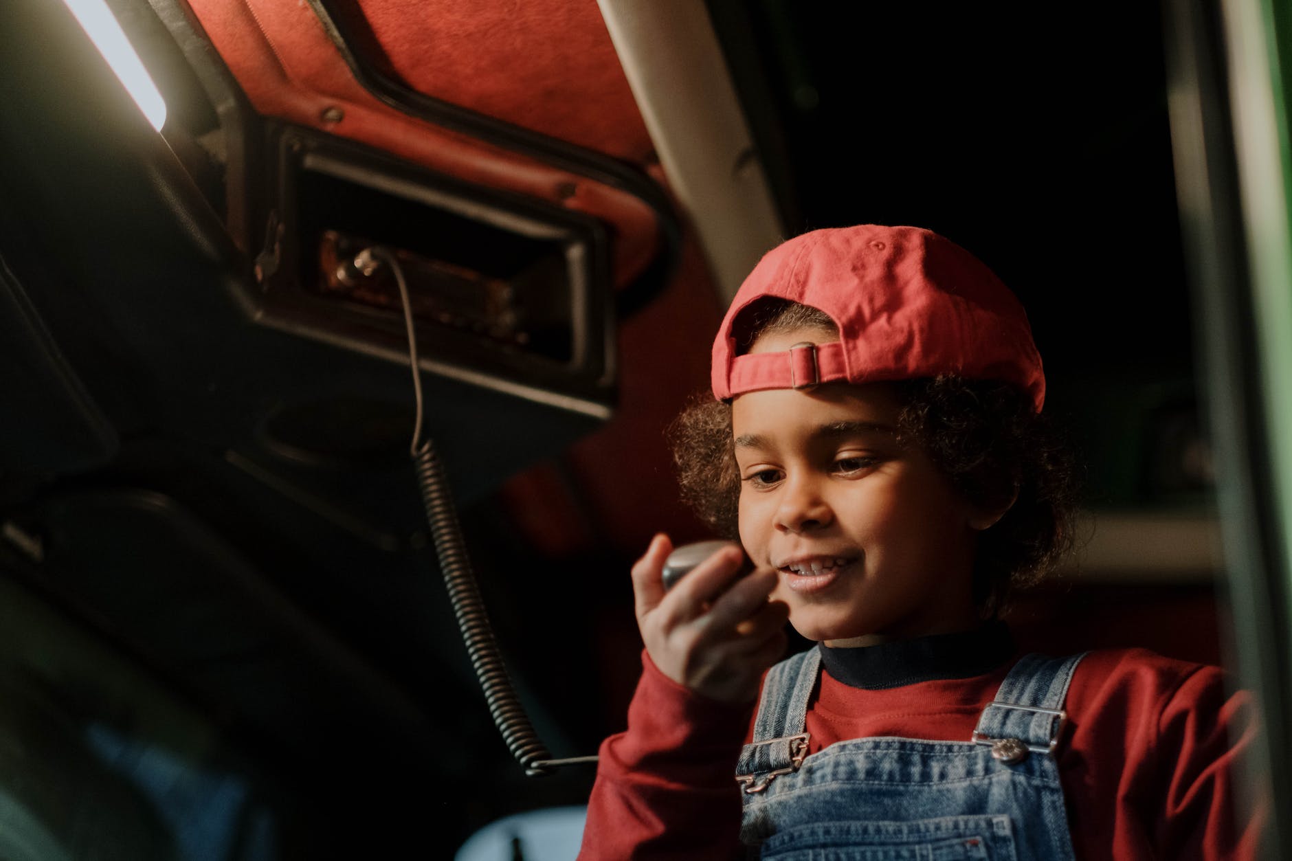 a boy wearing a cap